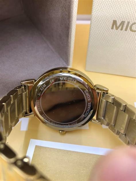 how can i check my michael kors watch serial number|michael kors watch authenticity check.